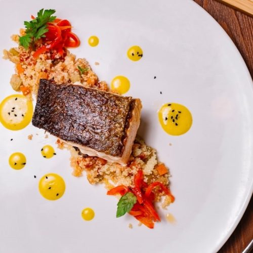 top-view-grilled-fish-fillet-served-top-couscous-salad-with-bell-peppers-min-1.jpg